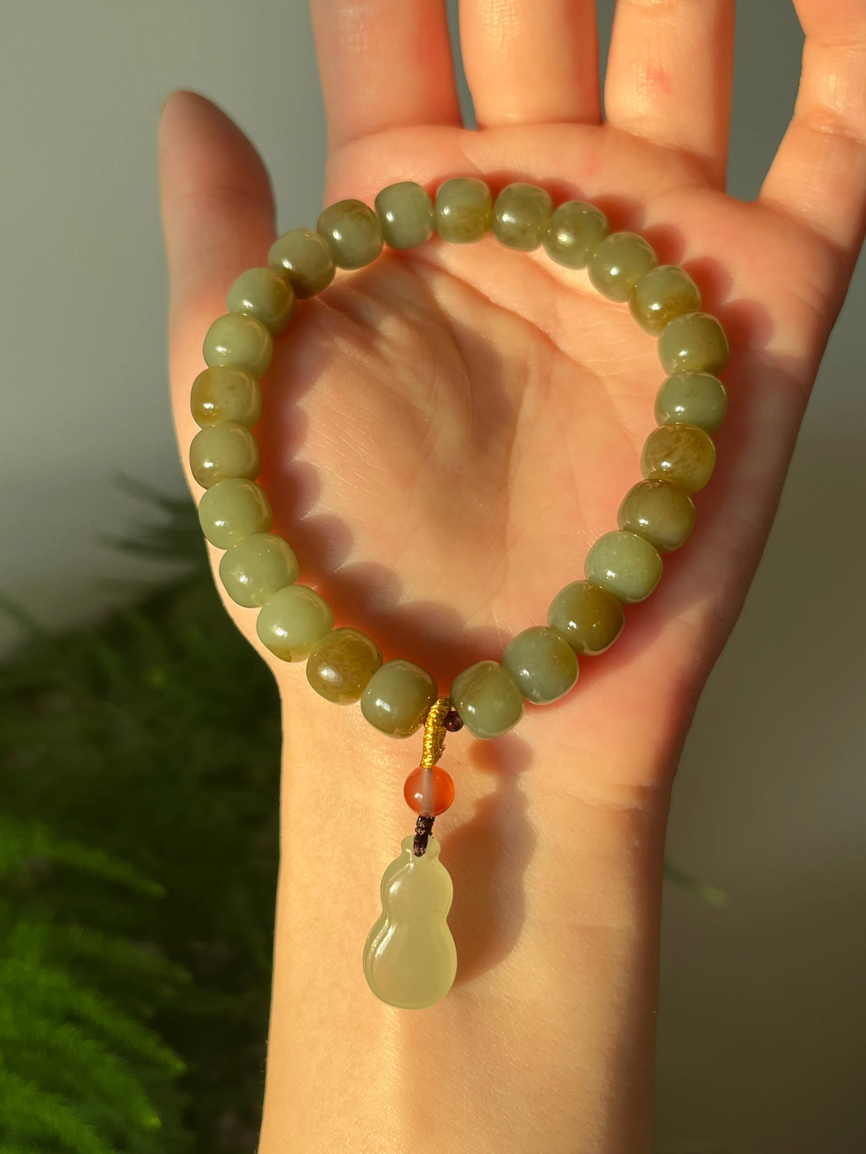 Blue and Brown Nephrite Jade Bracelet with 8mm x 6mm Barrel Beads and a Jade Hulu Pendant