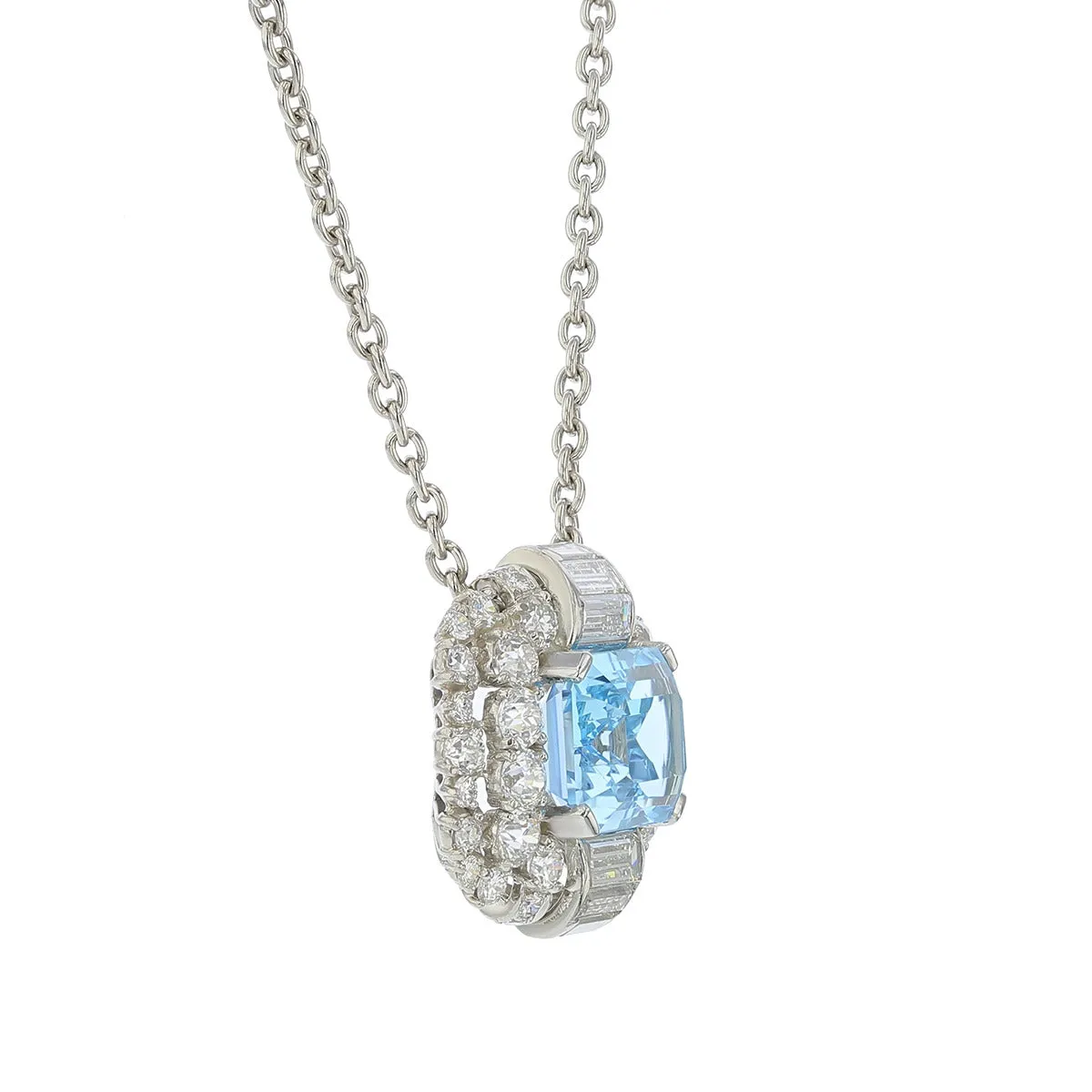 Platinum Sku Blue Topaz and Diamond Halo Pendant